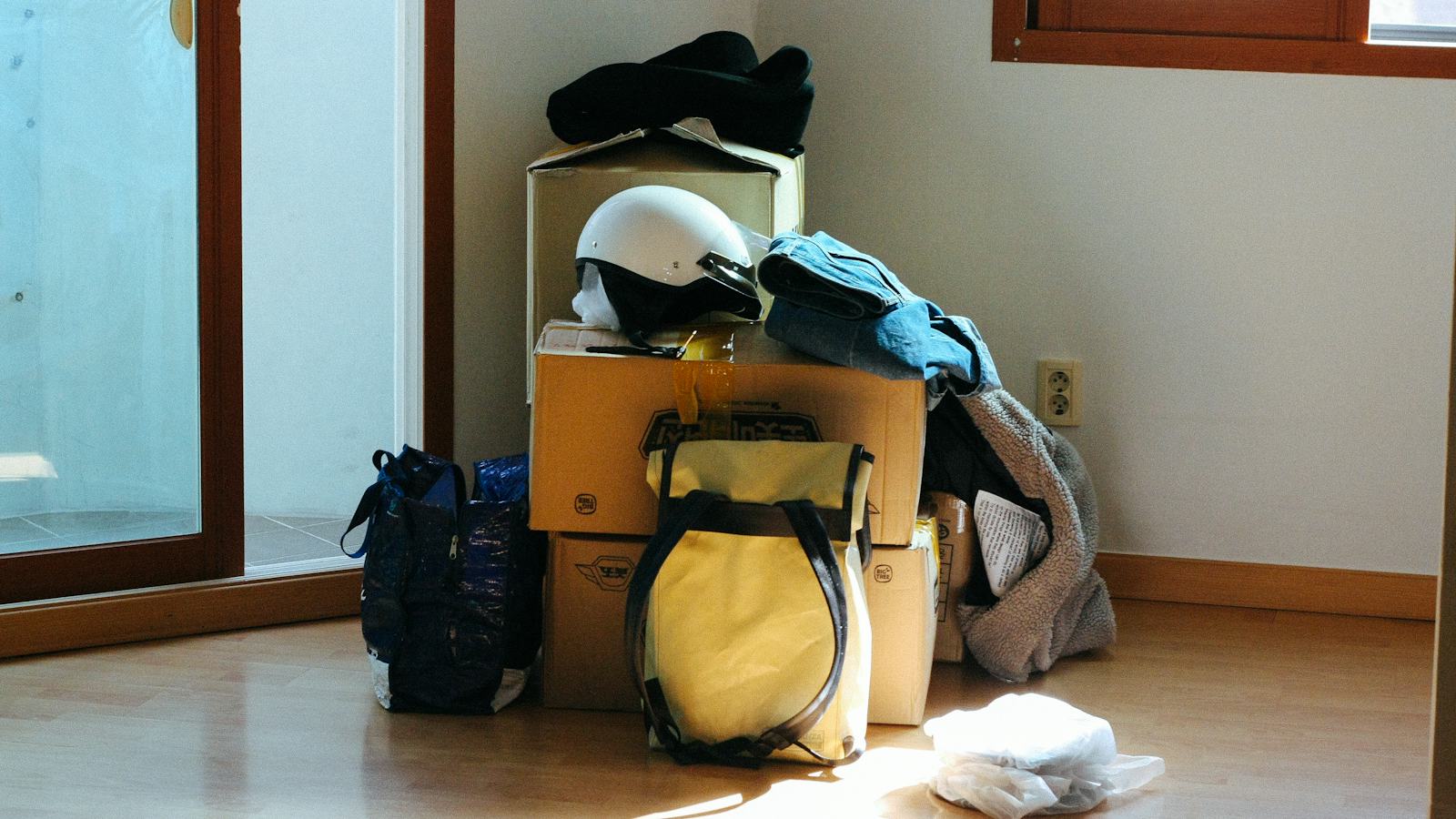 A backpack resting on a wooden table in a new home
